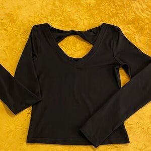 Athleta Black Long Sleeve Women’s top with Cut Out Twisted Back